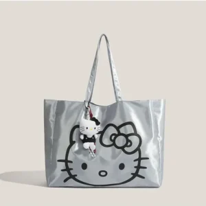 Hello Kitty silver tote bag with plush keychain charm