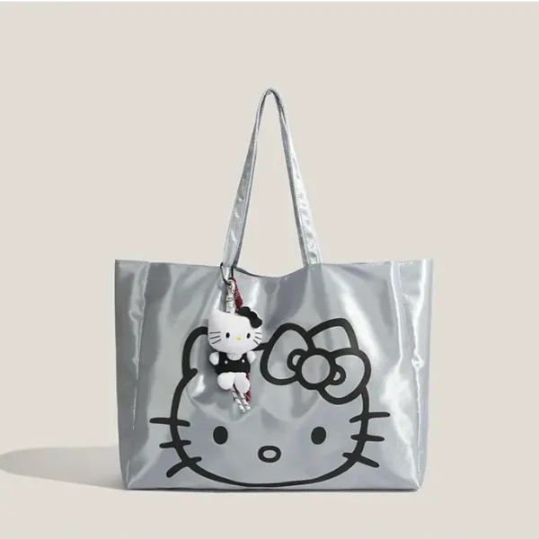 Hello Kitty silver tote bag with plush keychain charm