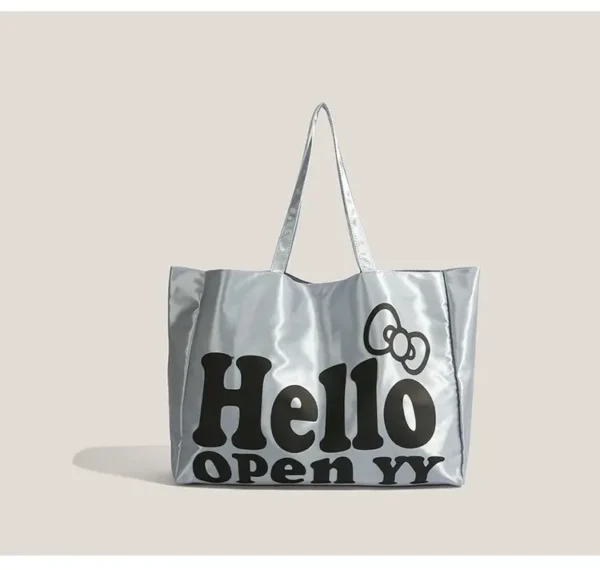 Hello Kitty silver tote bag with plush keychain charm
