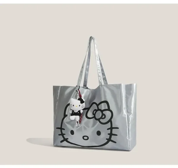 Hello Kitty silver tote bag with plush keychain charm