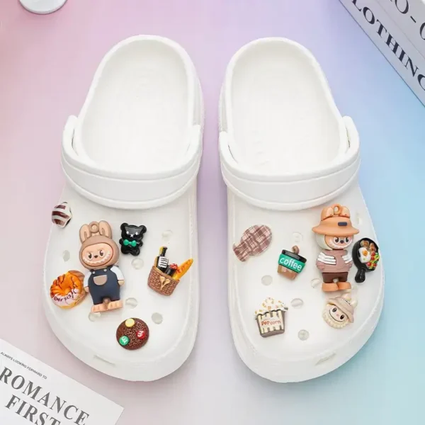 Top-down view of charms on both Crocs shoes