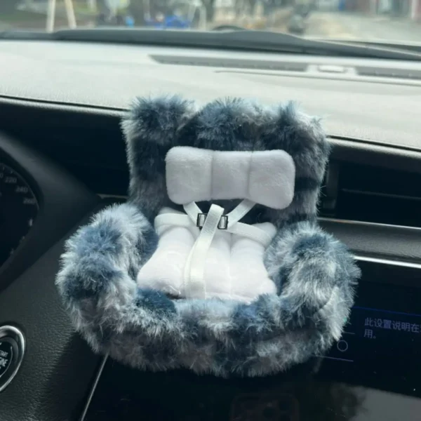Plush pink car safety seat for dolls and toys with soft cushion and Velcro straps, perfect for Labubu and other figures.