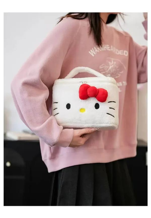Sanrio Hello Kitty plush makeup bag in white with red bow