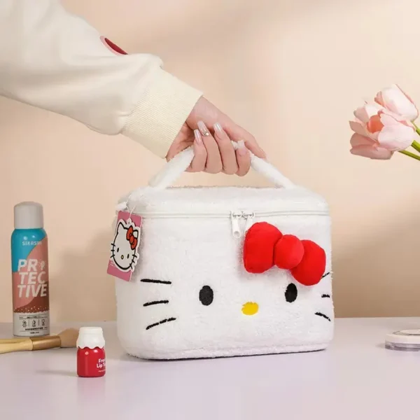 Sanrio Hello Kitty plush makeup bag in white with red bow
