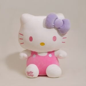 Sanrio Kawaii Hello Kitty plush doll with pink overalls and purple bow
